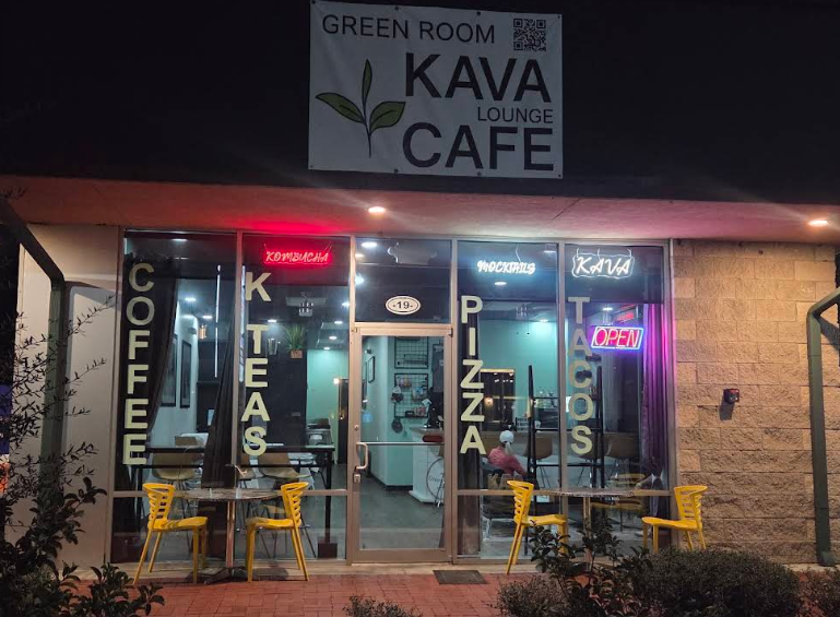Green Room Kava Lounge Cafe storefront at night